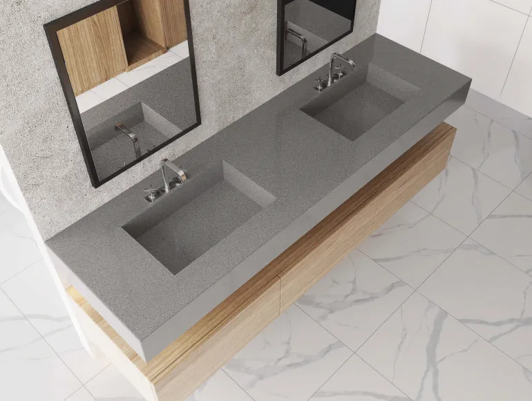 Countertop design paired with wooden vanity and marble flooring